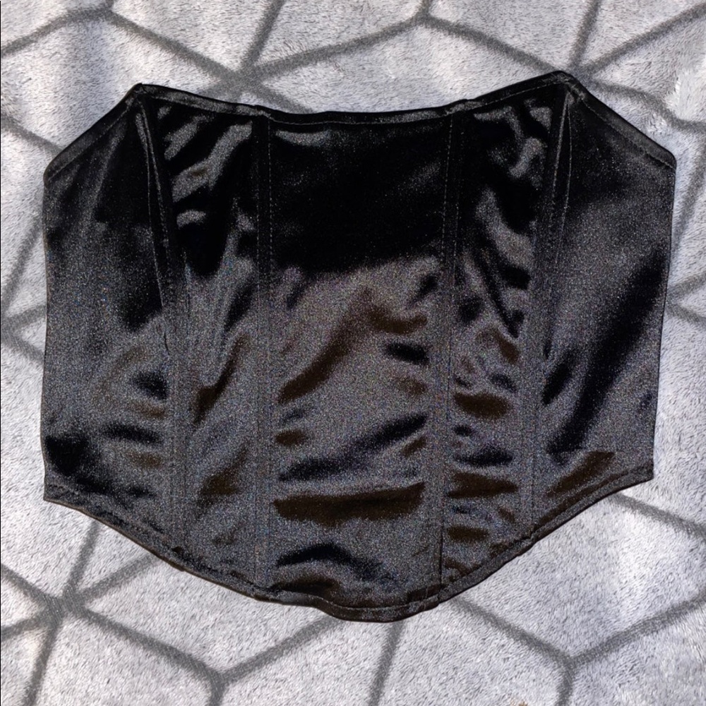 Black strapless corset top.